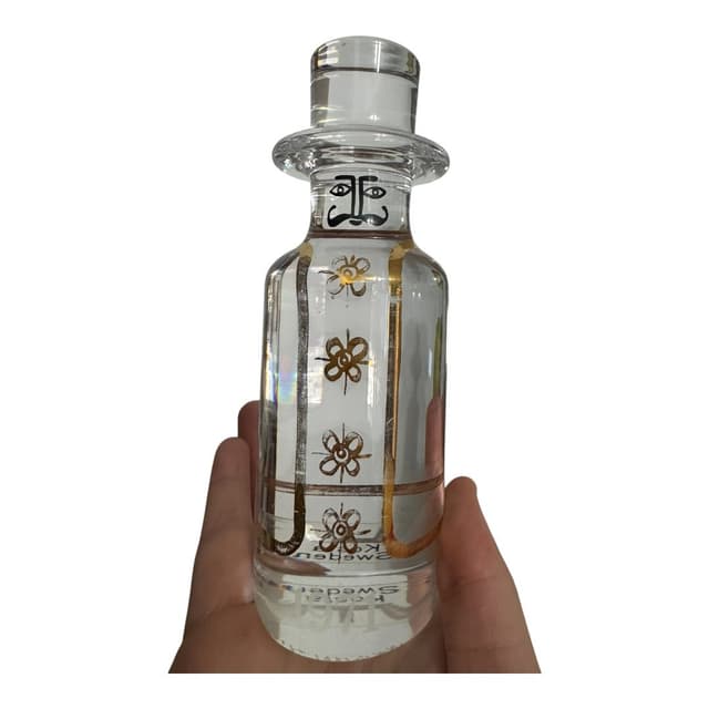 Vintage Kosta Sweden Glass Decanter with Gold Flower Motifs and Face Stopper